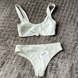 Wanderlust white ribbed/textured bikini. Size small top and medium bottoms. New